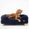 Bolster dog bed with feet in corduroy navy