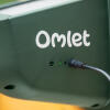 A close up of the power light on the Omlet smart fan