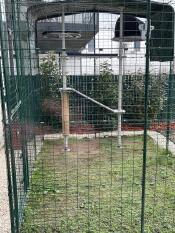 The Outdoor Freestyle Maya Cat Tree kit set up in a Catio.