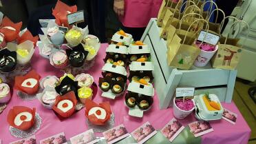 Lovely little egg boxes filled with carrot cakes at charity sale