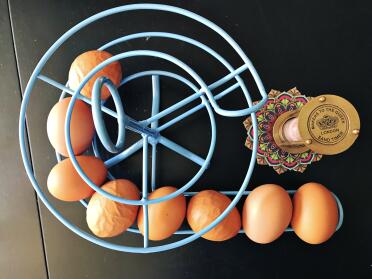 This design,unlike any other, allows you to store it towards the back of the counter, and still have access to your eggs on the front of the “run”.