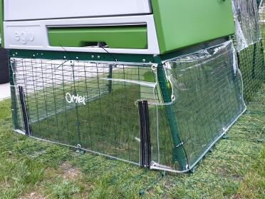 Green Eglu Cube large chicken coop and run with clear covers