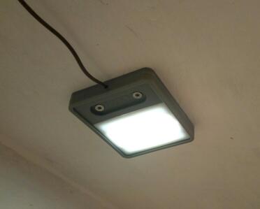 The Omlet coop light attached the inside of a chicken house.