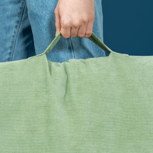 Cushion dog bed handle in corduroy green