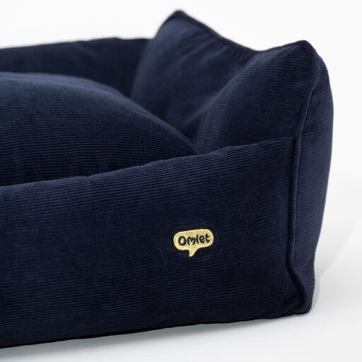 detail of super soft luxurious navy cord nest bed