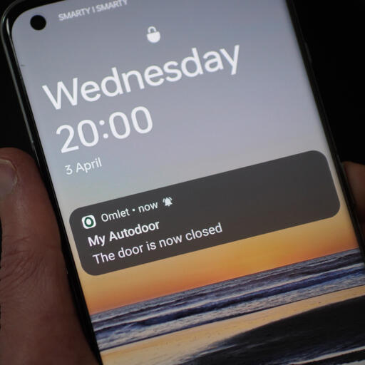 Phone with notifications about the status of the Omlet smart automatic coop door