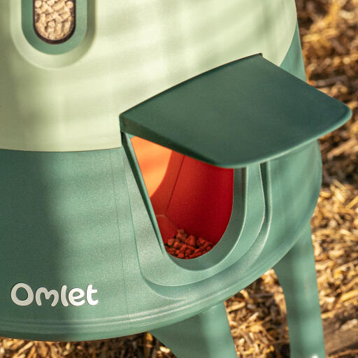 Detail of Omlet automatic chicken feeder port