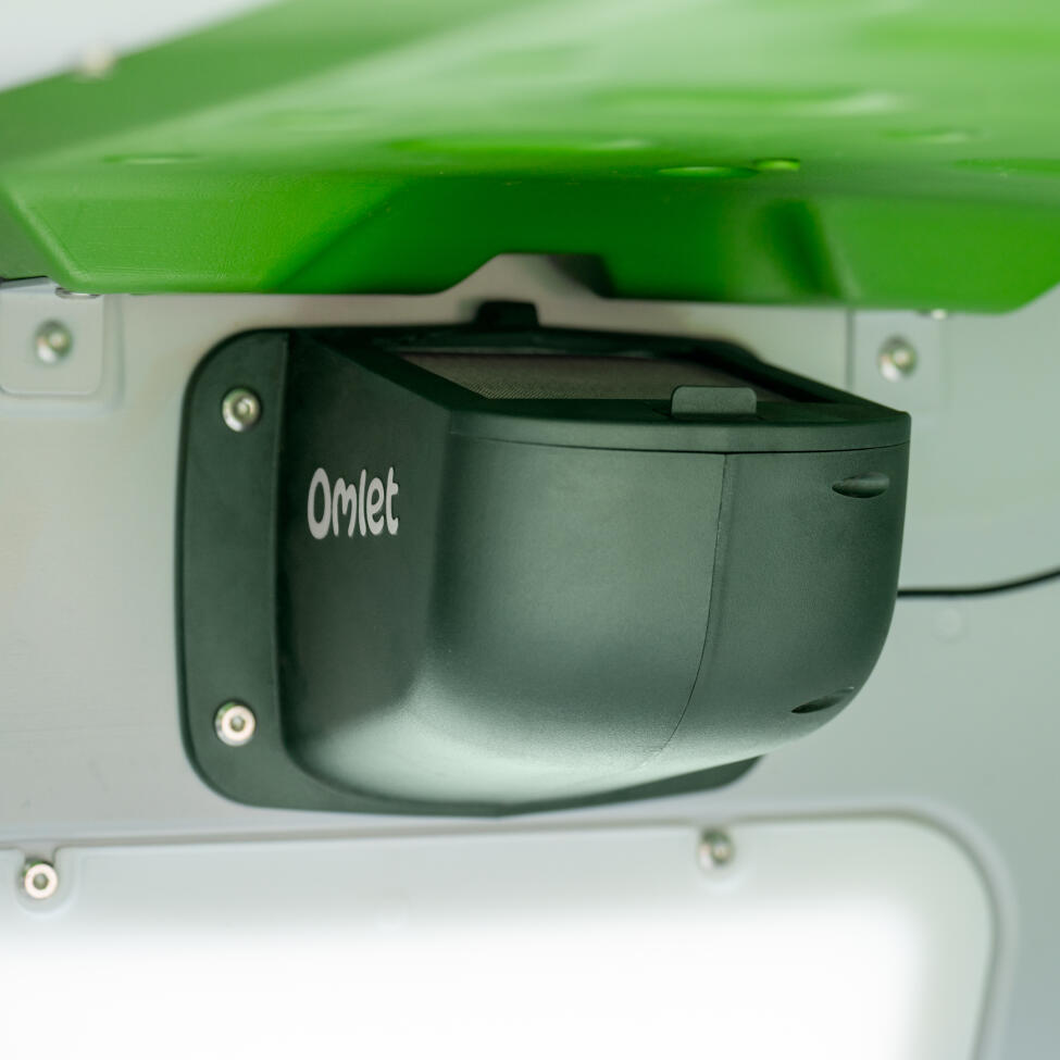 A close up of the Omlet smart fan attached to the inside of the Eglu pro chicken coop
