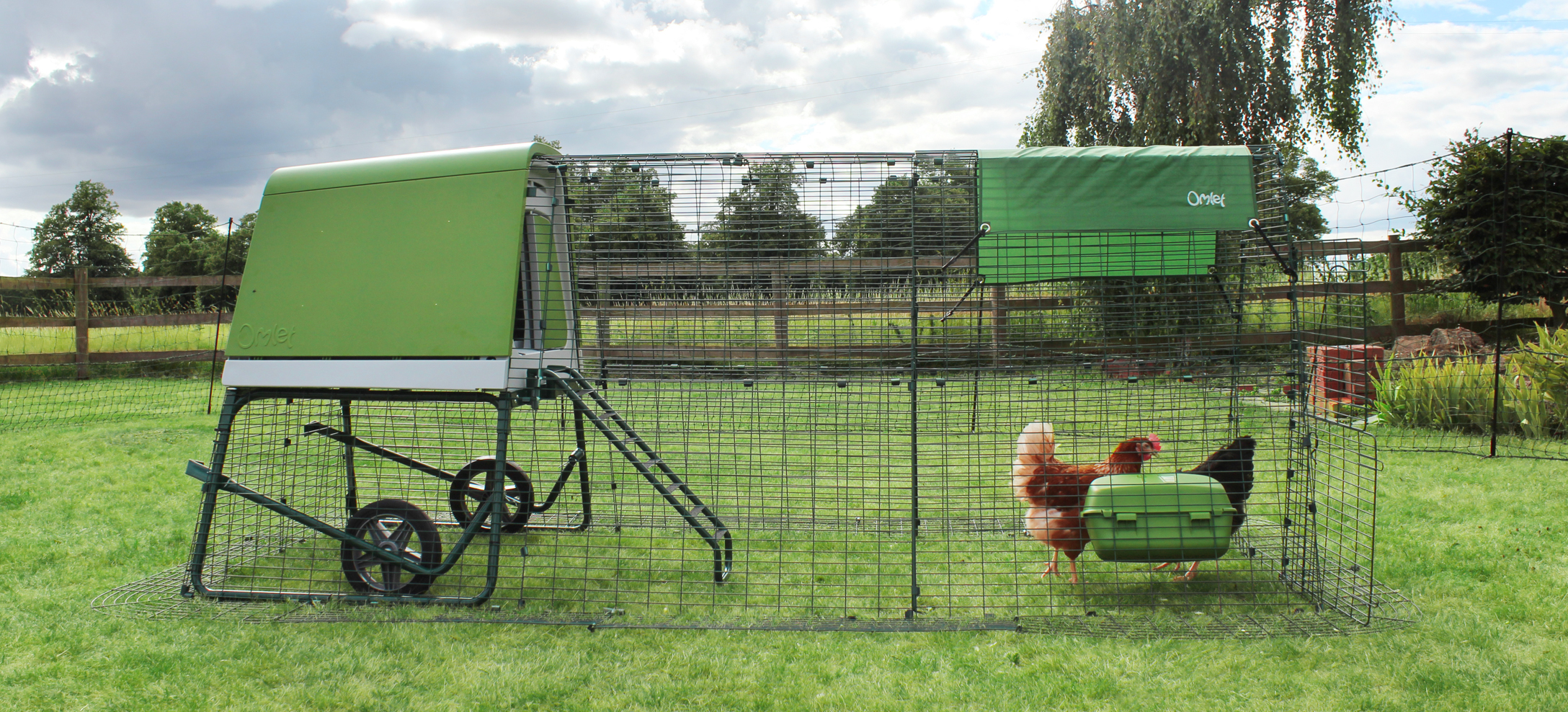 An Eglu Go UP modern chicken coop with run extension. An Eglu Go UP modern chicken coop with run extension.